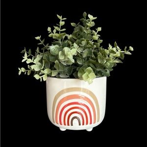 Faux plant in ceramic pot